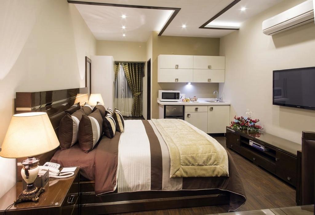 Royaute Luxury Suites And Hotel Gulberg לאהור חדר תמונה